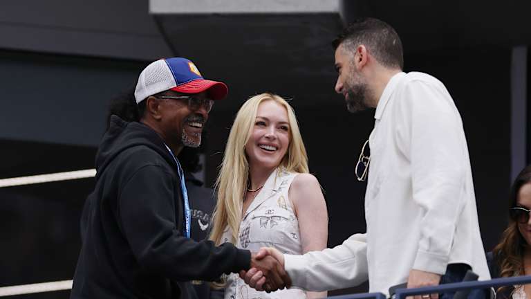 Actor Tim Meadows (Saturday Night Live, Mean Girls) greets Lindsay Lohan (Mean Girls, Freakier Friday) and husband Bader Shammas.