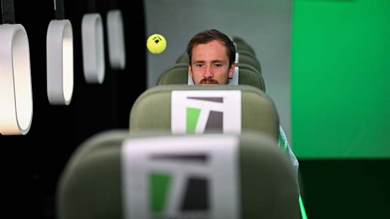 A tennis ball is never far from Medvedev—even when he's not holding one.